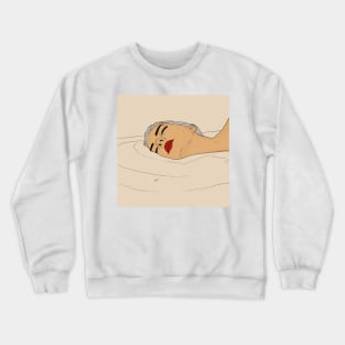 Girl lying in the water Crewneck Sweatshirt